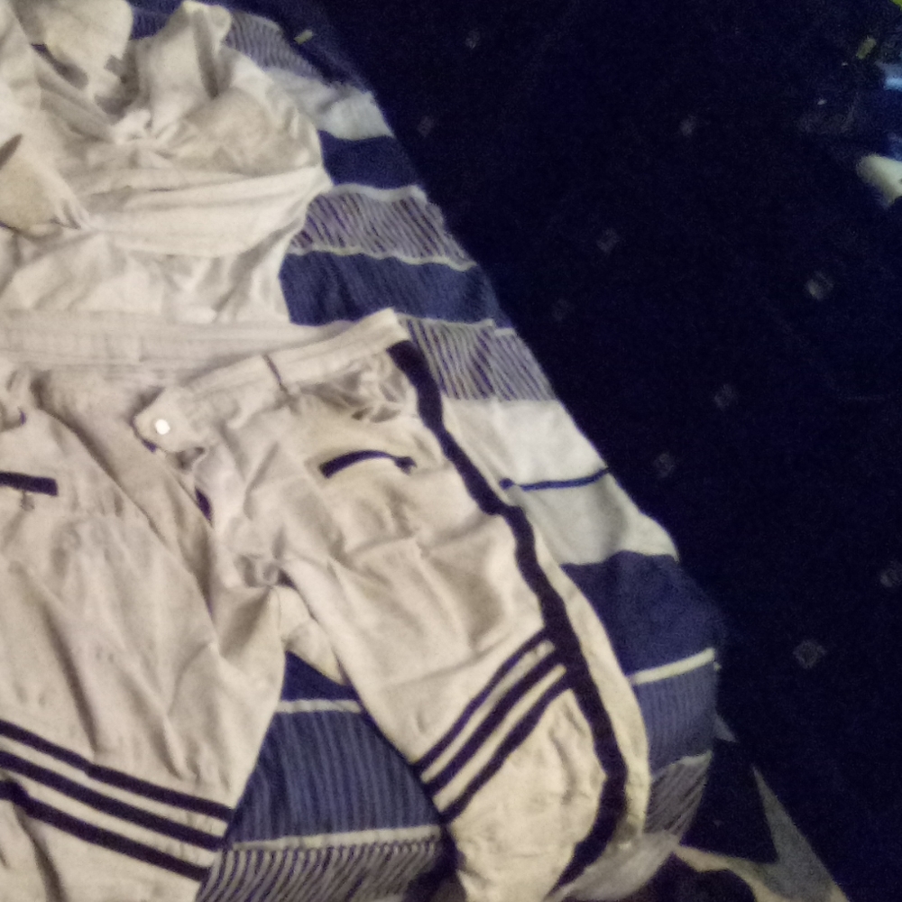 White shirt white black with stripes